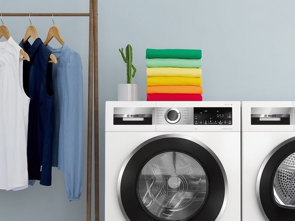 Máy giặt Bosch 10kg: toàn bộ Series 8, công nghệ đỉnh cao và so sánh 5 model 5 Gia đình Việt Nam hiện đại sử dụng máy giặt Bosch 10kg Series 8 trong phòng giặt